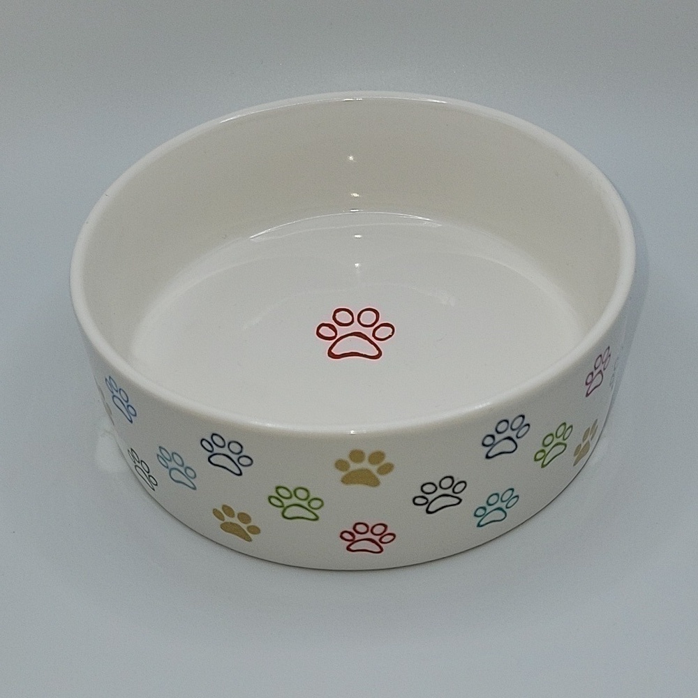 Fringe STUDIO dog or cat food bowl.  5" in Dia. 2" high.  Paw prints.